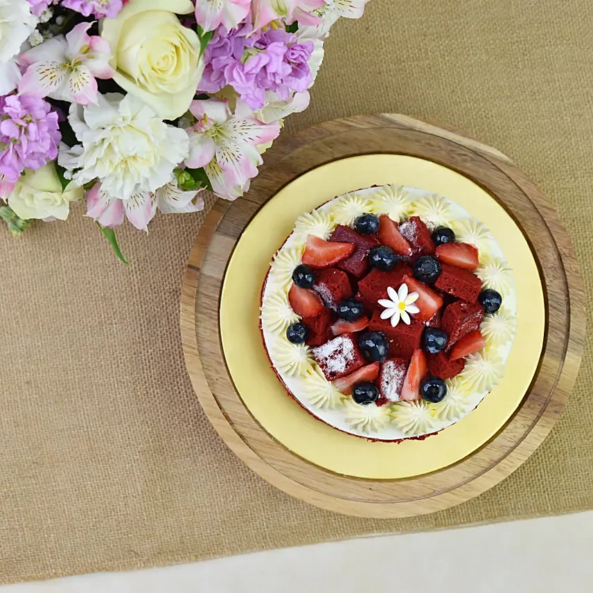 Red Velvet Cake with Pink Floral Arrangement - Image 3